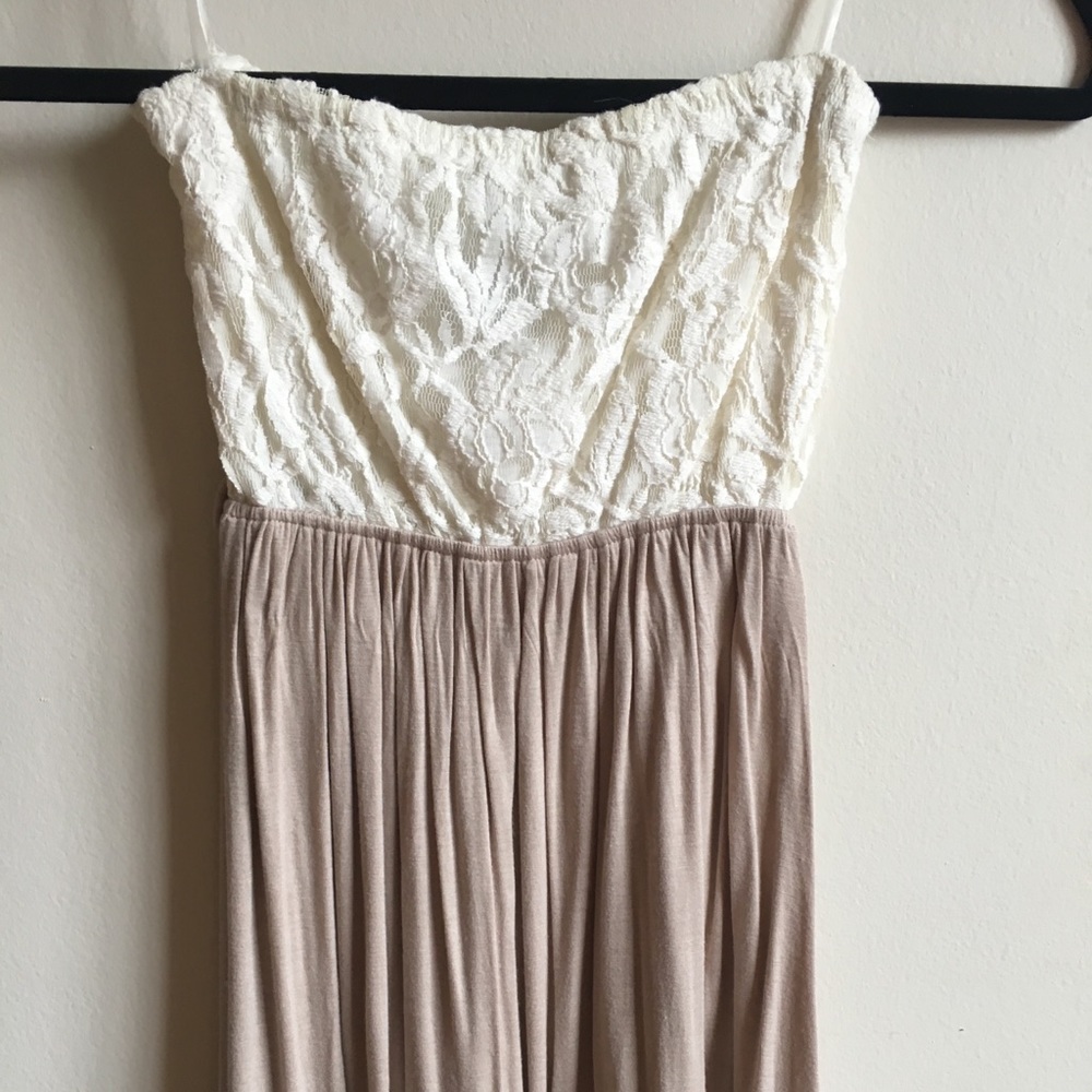 Strapless tan and cream top.